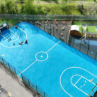 Aeriel View of a MUGA with Blue Surfacing
