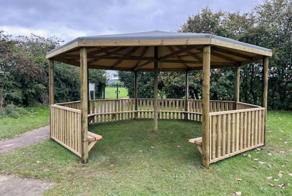 Gazebo with seating on grass