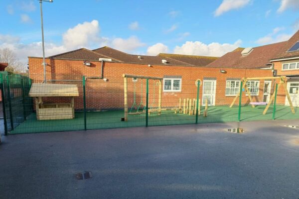 Inclusive play space with MUGA fencing.