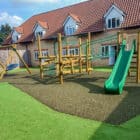 Outdoor Play Equipment on Rubber Mulch Safer Surfacing