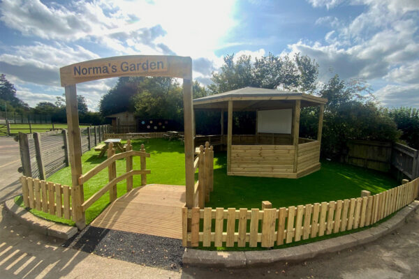 Outdoor Playground Area with Gazebo and Benches