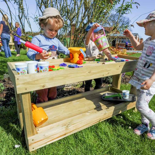Children Playing on Outdoor Early Years Play Equipment