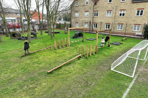 Children Playing on Outdoor Timber Racing Trail
