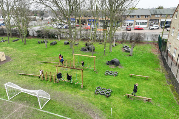Children Playing on Outdoor Timber Racing Trail